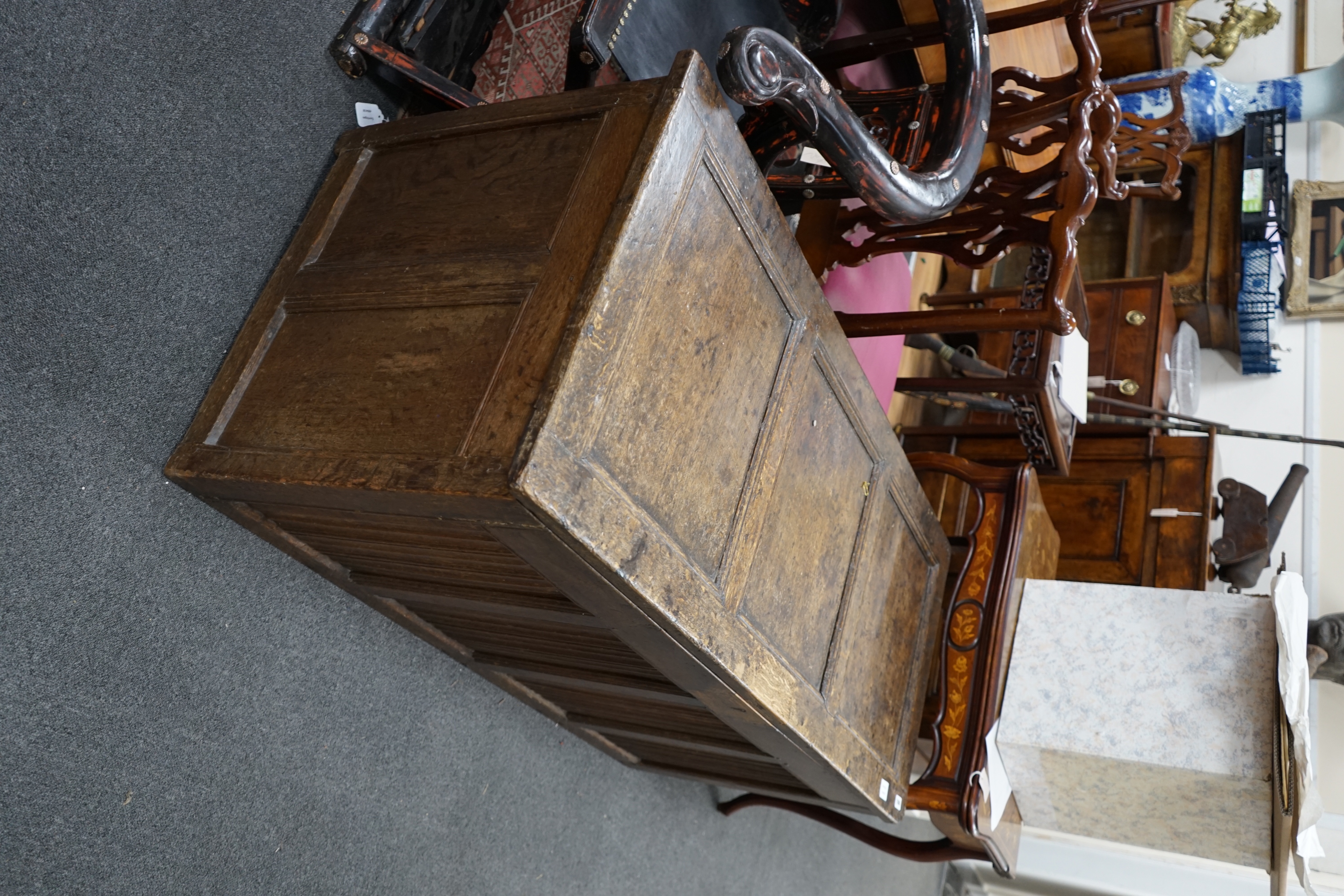 A 17th / 18th century panelled oak coffer, width 140cm depth 61cm height 62cm